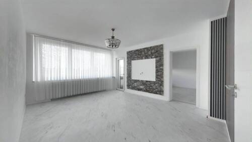 Wohnzimmer - Gepflegte und modernisierte 3-Zimmer-Eigentumswohnung mit Balkon