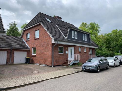 Außenansicht - Schöne Doppelhaushälfte im Pinneberger Quellental, Sackgassenendlage