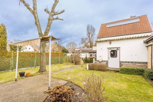 Gartenansicht vom Haus - Einfamilienhaus mit 61,50 m&sup2; in Berlin zum Kaufen