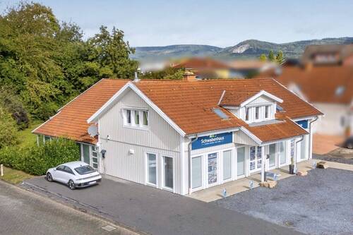 Südseite - Charmantes Schwedenhaus: Vielseitiges Wohn- und Geschäftshaus mit großzügigem Garten und Raumvielfalt