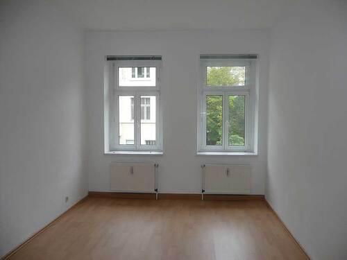 Schlafzimmer mit Laminat - 
