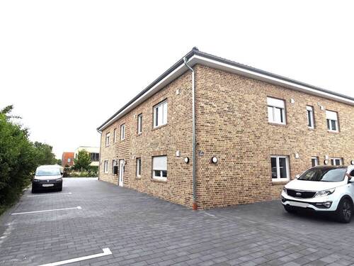 Bild 1 - Obergeschoss-Eigentumswohnung nach neustem Energiestandard mit Balkon