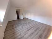 Einblick Wohnzimmer Bild 2 - Etagenwohnung mit 47,90 m&sup2; in Stralsund zur Miete