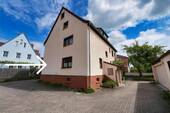 Außenansicht - Wohnungspaket mit Potenzial - 2 Einheiten, Balkon und großzügige Garage