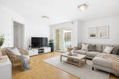 virtuell bearbeitetes Wohnzimmer - Moderne 2-Zimmer-Wohnung mit Balkon und Stellplatz