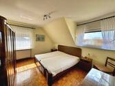 Schlafzimmer im Dachgeschoss - 