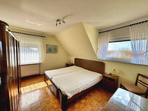 Schlafzimmer im Dachgeschoss - 
