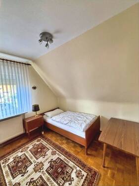 kleines Zimmer im Dachgeschoss - 