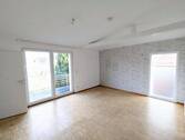 Wohn- und Essbereich - 2-Zimmer-Wohnung mit offener Küche und Balkon in zentraler Lage von Harsewinkel