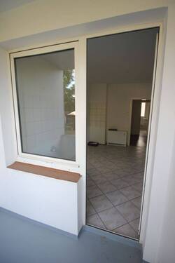 Küche mit Zugang zum Balkon - 