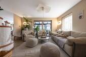 Wohnbereich mit Blick in den Wintergarten - 