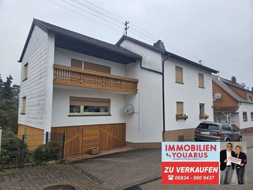 Zweifamilienhaus in Ottweiler zu verkaufen - Freistehendes und geräumiges Zweifamilienhaus mit Balkon, Garten, Garagen in Ottweiler