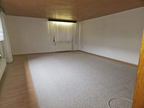 OG Whg.: Wohn- und Esszimmer, Ausgang auf den Balkon - 