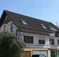 Zweifamilienhaus mit ELW und Gewerbeeinheit in Langenenslingen