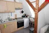 offene Küche - Etagenwohnung mit 50,00 m&sup2; in Aurich zur Miete