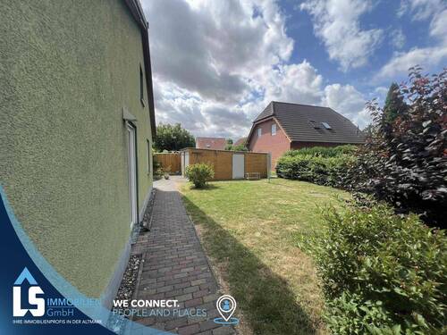 Seitenansicht aus dem Garten - Bungalow mit 102,00 m² in Halberstadt zum Kaufen
