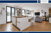 Titelbild - Moderne Etagenwohnung mit Kamin und grünem Weitblick