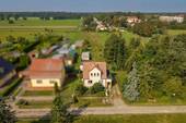 Drohnenansicht - 5 Zimmer Einfamilienhaus zum Kaufen in Paulinenaue