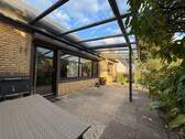 Terrasse: dekorativ überdacht - Einfamilienhaus mit 141,00 m² in Norderstedt zum Kaufen