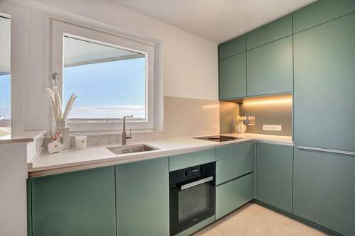 Hochwertige Küche. - Etagenwohnung mit 75,50 m&sup2; in München zum Kaufen