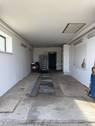 Garage innen mit Grube - 