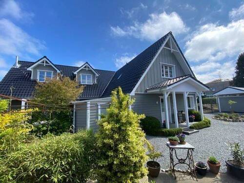 258_Blick aufs Zweifamilienhaus - 4 Zimmer Etagenwohnung zum Kaufen in Wendtorf