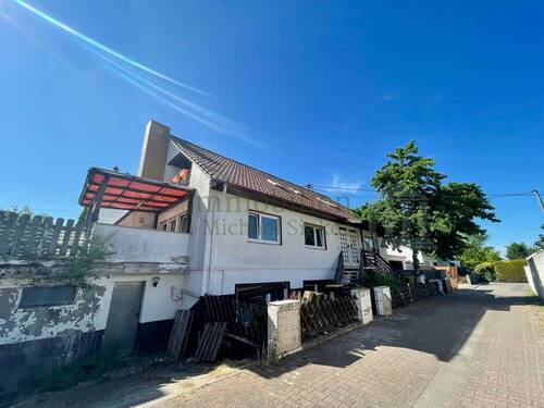 Hausansicht 2 - Mehrfamilienhaus in Hamm am Rhein mit großem Potenzial für ein 4-5 Familienhaus