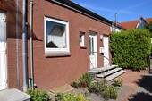 Vorderansicht - Familienfreundliche Lage! Gepflegtes Reihenmittelhaus in Bassum!