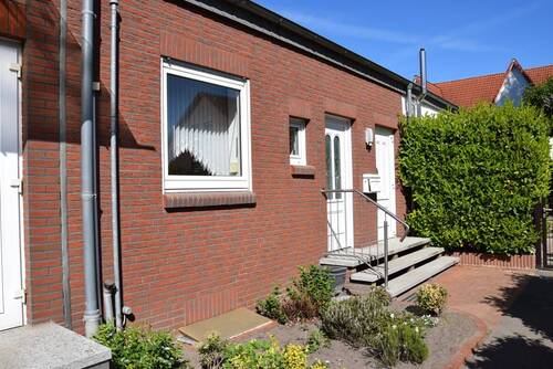 Vorderansicht - Familienfreundliche Lage! Gepflegtes Reihenmittelhaus in Bassum!