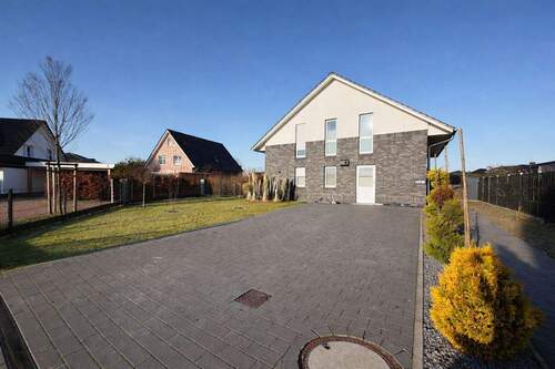 Außenansicht - Volksbank Immobilien: Familientraum mit Stil - Großzügiges, modernes Einfamilienhaus