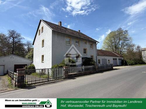 Titelbild - Vielseitiges Anwesen: Zweifamilienhaus mit Werkstatt