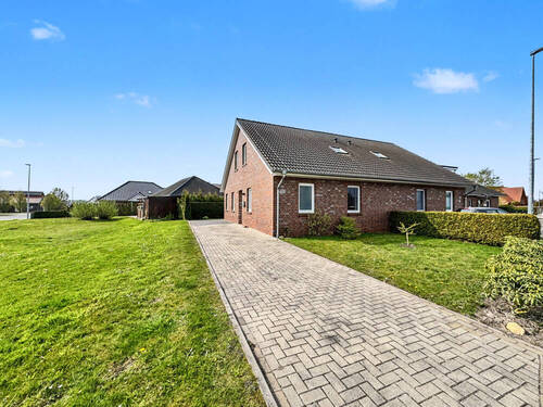 Außenansicht - Doppelhaushälfte mit 96,80 m&sup2; in Rhauderfehn / Westrhauderfehn zum Kaufen
