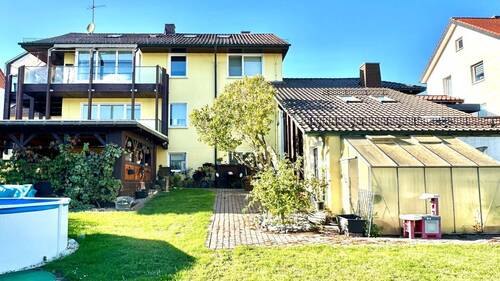 Hausansicht - 6 Zimmer Mehrfamilienhaus, Wohnhaus zum Kaufen in Friedewald