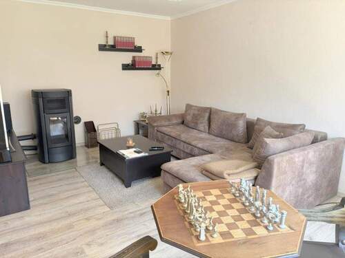 Wohnzimmer mit Ofen - 