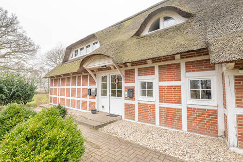 Seiteneingang - Mehrfamilienhaus, Wohnhaus zum Kaufen in Hemmoor
