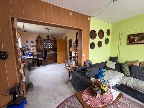 Wohnzimmer EG - Einfamilienhaus mit 150,00 m² in Windeck zum Kaufen