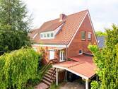 Außenansicht - Großzügige Doppelhaushälfte mit Balkon, Terrasse & vielseitigen Nutzungsmöglichkeiten in Hage