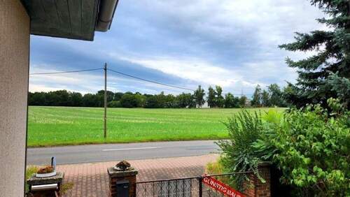 1 - Einfamilienhaus mit Fernblick am Ortsrand – 6 Zimmer, Garten & 2 Garagen