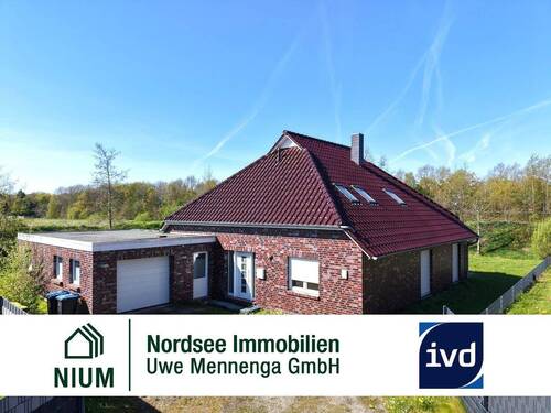 Außenansicht - Exklusives Wohnen mit vielen Extras. Großzügige offene Wohnküche mit moderner Küche und Galerie.