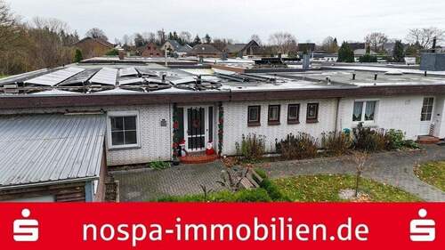Drohnenbild - Modernisierter Bungalow mit Süd-Terrasse, Garage und Einliegerwohnung im Anbau in Flensburg-Weiche