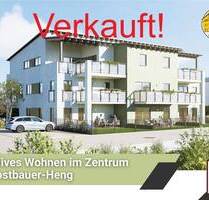 L(i)ebenswertes Wohnen im Zentrum von Postbauer-Heng mit KfW40 QNG: 2,5-Zimmer-Wohnung mit Terrasse und Gartenanteil