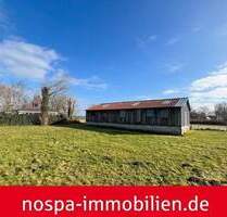 Großes Wohnbaugrundstück mit Restbausubstanz in Tating!