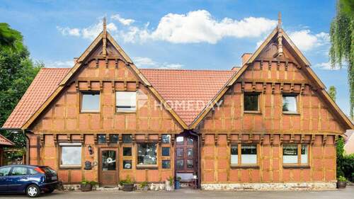 Außenansicht 2 - 1 Zimmer Mehrfamilienhaus, Wohnhaus in Holdorf