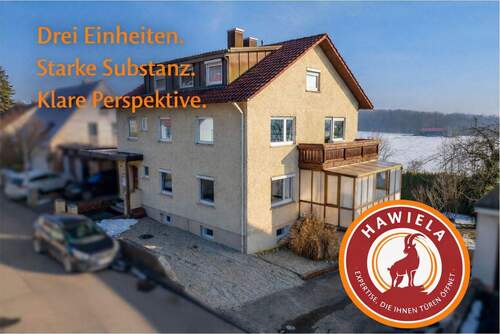 Titelbild - Willkommen Zuhause: Wohnen & Anlegen in Elchingen - charmantes 3-Familienhaus mit Gartenidylle