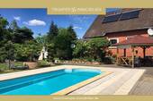 Truemper-Immobilien-Reppenstedt Haus mit Pool00001 - Wohnen mit Urlaubsflair: Haus mit Pool und großem Garten in Reppenstedt
