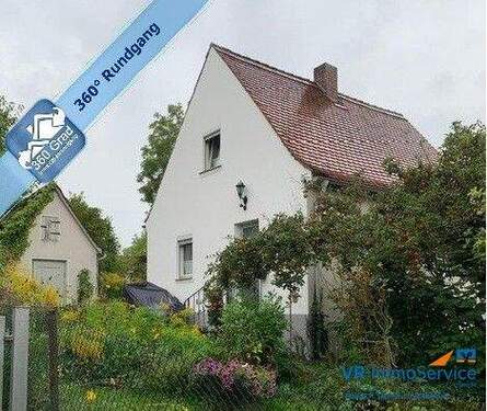 Bild 1 - Für begabte Handwerker: Einfamilienhaus mit wunderschönem Grundstück in ruhiger Lage von Roßtal!