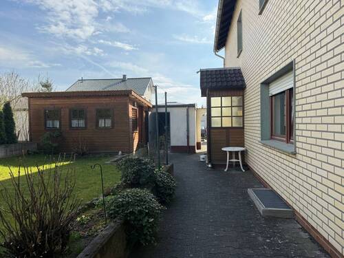 Blick zum Eingang 2 FH - Mehrfamilienhaus, Wohnhaus mit 240,00 m&sup2; in Brakel zum Kaufen