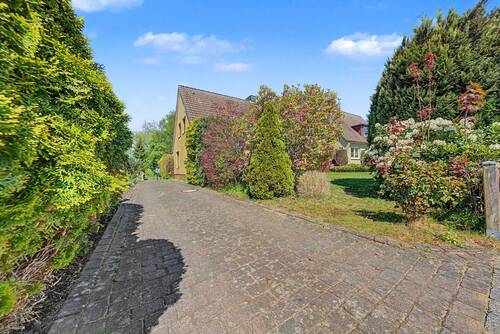 Durchfahrt mit Wegerecht - Einfamilienhaus mit 118,60 m&sup2; in Breitenburg zum Kaufen