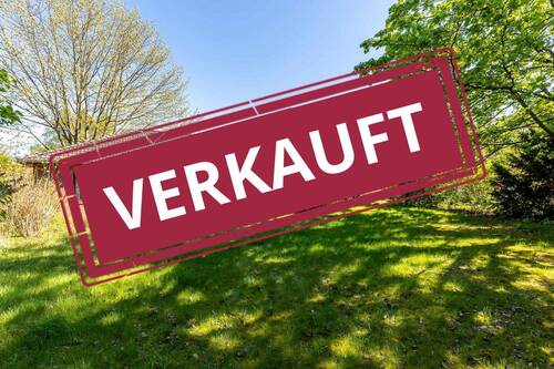 Bild 1 - RESERVIERT: Wohnen auf einer Ebene: Bungalow auf großem Grundstück in Vögelsen