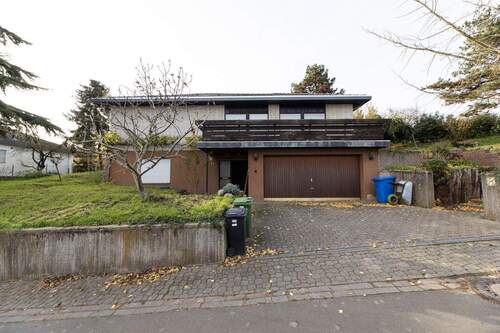 Front (2).jpg - Winkelbungalow auf sonnigem Grundstück mit viel Potenzial zur individuellen Renovierung